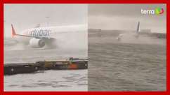 Tempestade inunda pista de aeroporto e faz aviões ...