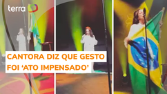 Cantora pede desculpas por pisar em bandeira do Brasil em show