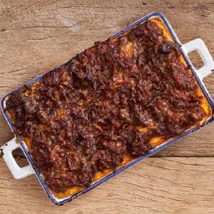 Aprenda a fazer polenta cremosa com molho de carne