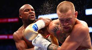 Mayweather vence McGregor por nocaute técnico e bate recorde