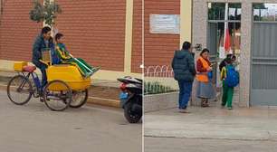 Pai leva filho à escola pedalando em seu carrinho de sorvete e viraliza; vídeo