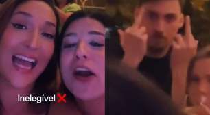 Filho de Bolsonaro faz gesto obsceno após ser provocado em festa; veja