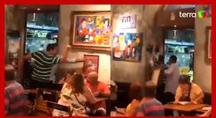 Homem destrói placa de Marielle e quebra quadro com imagem de Lula em bar no RJ
