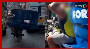 Motociclista é flagrado levando caixa d'água na garupa de moto no RJ