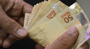 Novo salário mínimo de R$ 1.502 pode causar impactos na economia! Veja quais são