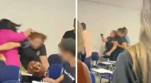 Estudante aponta arma para colega durante briga em faculdade em Maceió; VÍDEO