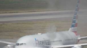 Veículo de reboque de avião da American Airlines pega fogo no Aeroporto de Guarulhos; veja