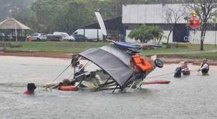 Bombeiros resgatam três pessoas em barco que afundava em lago no DF durante chuva