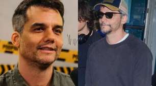 Wagner Moura faz rara aparição com filho mais velho ao desembarcar no Brasil