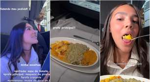Duda Guerra viaja em classe executiva e mostra menu com entrada, prato principal e sobremesa