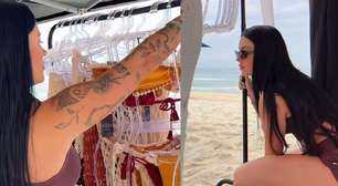 Namorada de Belo, Rayane Figliuzzi vende biquínis em praia no RJ