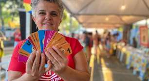 Feira distribui "moeda literária" para compra de livros na periferia de SP