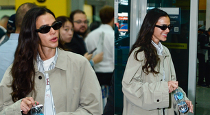 Trench coat cáqui, conjunto listrado e bolsa Gucci de R$ 12 mil: o aerolook comfy e elegante de Bruna Marquezine ao voltar dos EUA