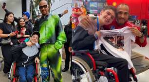 Garoto com paralisia cerebral realiza sonho de conhecer Lewis Hamilton