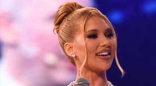 Virgínia elege vestido vermelho grifado com punhos bufantes e arremata jogo com namorado, Vini Jr,, em leilão beneficente de Ronaldo Fenômeno