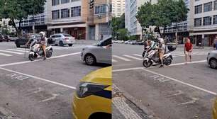 Lutador usa moto para ajudar idoso a atravessar rua no Rio de Janeiro