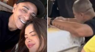 Suspeito de jogar a própria esposa do 10º andar é visto chorando no caixão