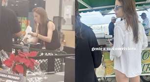 Milho na praia e compras em mercado: imagens de Suzane Richthofen no litoral de SP repercutem nas redes sociais