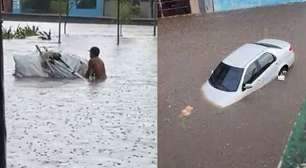 Carros boiando e pessoas com água na cintura: temporal alaga avenidas e causa transtornos na Grande SP