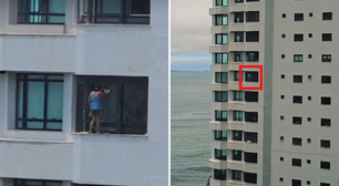 Mulher é filmada em pé em janela de prédio de luxo no Guarujá (SP)
