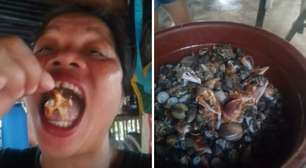 Influenciadora morre após comer 'caranguejo do diabo' em vídeo
