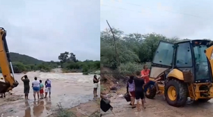 Mulher atravessa rio com retroescavadeira para realizar hemodiálise após forte chuva na Bahia