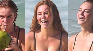De maiô recortado, Paolla Oliveira se refresca com banho de mar e água de coco em manhã de muito calor no RJ. 30 fotos!