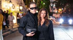 Isadora Cruz e Lucas Pinheiro usam looks iguais no desfile da Osklen, na abertura do Rio Fashion Week. Veja Sasha e mais convidados