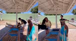 Vaca dá cabeçada em Nicole Bahls, que é derrubada e cai em bebedouro na fazenda