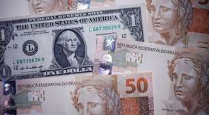 Dólar volta a fechar abaixo de R$5,00 após Trump adiar ataque contra o Irã