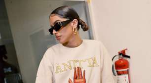 "Tô tirando onda, tudo isso sem tigrinho", canta Anitta a caminho dos EUA para abertura da Copa