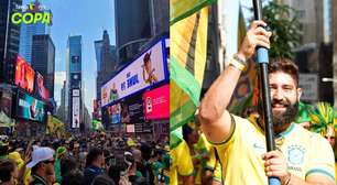 Brasileiros fecham Times Square com bandeiraço antes da estreia da Seleção na Copa do Mundo