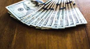 Câmbio: Dólar sobe após Fed adotar tom mais rígido