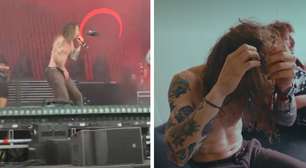 Vocalista leva drone na cabeça durante apresentação em festival
