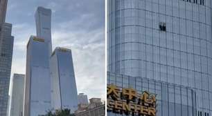 Avião de pequeno porte bate em arranha-céu mais alto de Pequim, na China