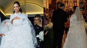 Vestido de noiva sem alças, capa gigantesca presa no pescoço e aplicação de flores: esposa de Thiago, dupla de Thaeme, Geórgia Fröhlich aposta no romantismo em casamento luxuoso. Fotos!