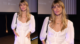 Como usar mangas bufantes no inverno: Carolina Dieckmmann mostra como aderir à trend romântica com vestido branco comfy em evento no RJ