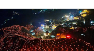 Show de luzes na China: as 10 mil lâmpadas que transformam os milenares terraços de arroz de Longji em cordões de pérolas brilhantes na noite