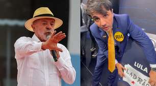 Renan Santos provoca Lula e coloca papel escrito 'ladrão' em púlpito vazio de debate na Band