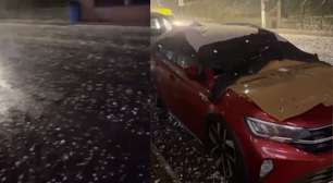 Lataria amassada e vidro quebrado: homem mostra prejuízo em carro por chuva de granizo em SC