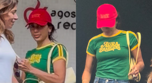 Discreta, Anitta vota no segundo turno com blusa do Brasil e boné vermelho