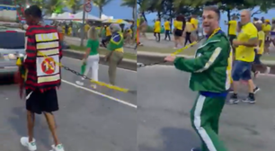 Vídeo de apoiador de Flávio Bolsonaro desfilando com homem negro acorrentado no Rio viraliza