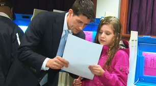 Vice de Romney vota com a "ajuda" dos filhos