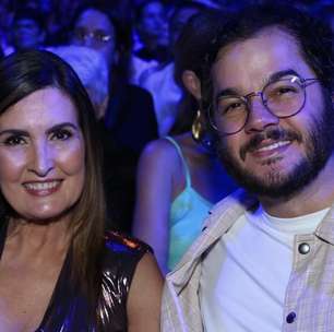 Fátima vai de metalizado e decotão ao show de Roberto Carlos