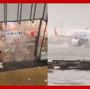 Chuva faz avião andar em pista alagada e causa transtornos em Dubai