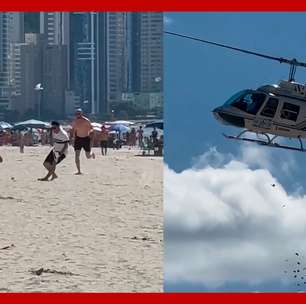 Helicóptero faz 'chover' dinheiro em praia de Santa Catarina