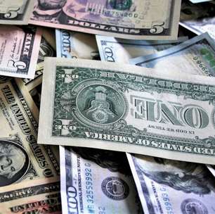 Câmbio: Dólar fecha em queda, apesar de pressões externas