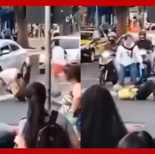 Motociclista e agente de trânsito são flagrados trocando socos no meio da rua em MG