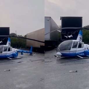 Helicóptero da Band faz pouso forçado em São Paulo e atinge carreta