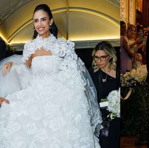Vestido de noiva sem alças, capa gigantesca presa no pescoço e aplicação de flores: esposa de Thiago, dupla de Thaeme, Geórgia Fröhlich aposta no romantismo em casamento luxuoso. Fotos!